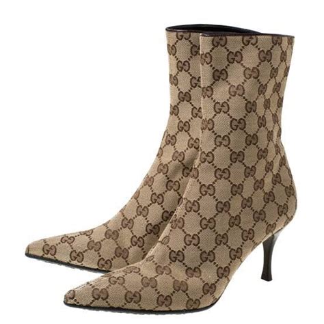 gucci jeans monogram|Gucci monogram boots.